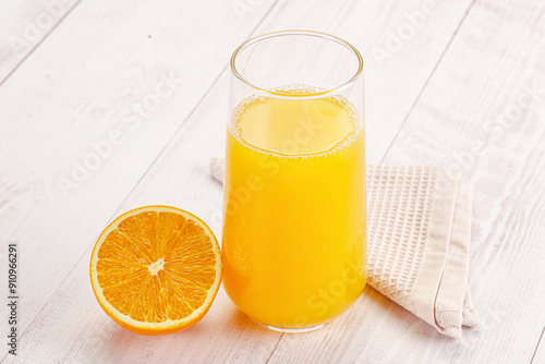 Sweet fresh orange juice in the glass