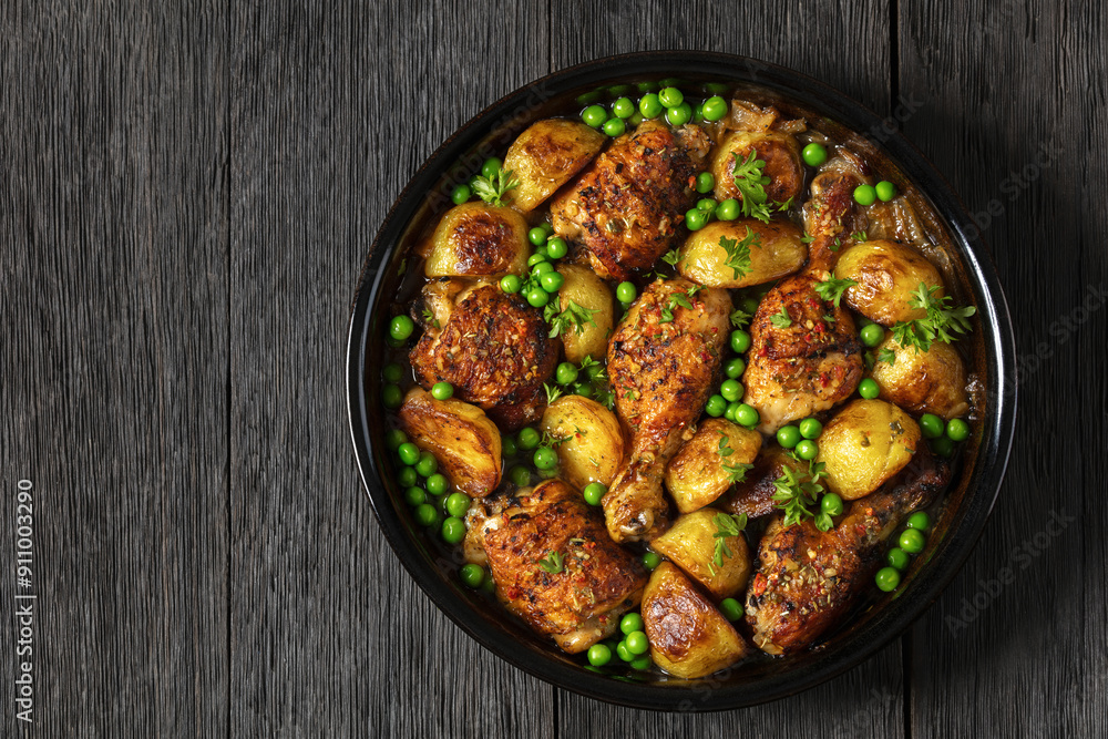 Chicken Vesuvio in a baking dish, top view Chicken Vesuvio in a baking dish, top view