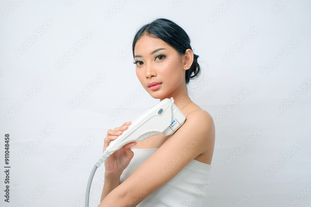 Elegant Asian Woman with Bun Receiving HIFU Therapy Elegant Asian Woman with Bun Receiving HIFU Therapy