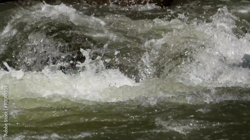 Wallpaper Mural A rocky river flow that still looks natural in the countryside. The river water looks clean and clear. Appearance of the river surface with stone structures. Footage 4K,60fps Torontodigital.ca