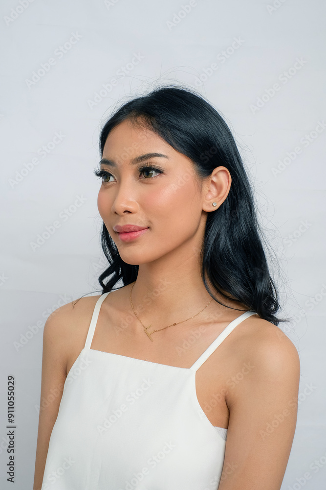 Side View Radiant Asian Woman with Long Black Hair in White Dress and Tan Skin Side View Radiant Asian Woman with Long Black Hair in White Dress and Tan Skin