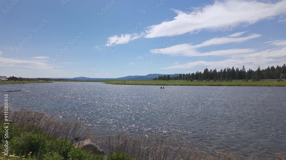 People kayaking on the Henry's Fork in Island Park, Idaho. People kayaking on the Henry's Fork in Island Park, Idaho.