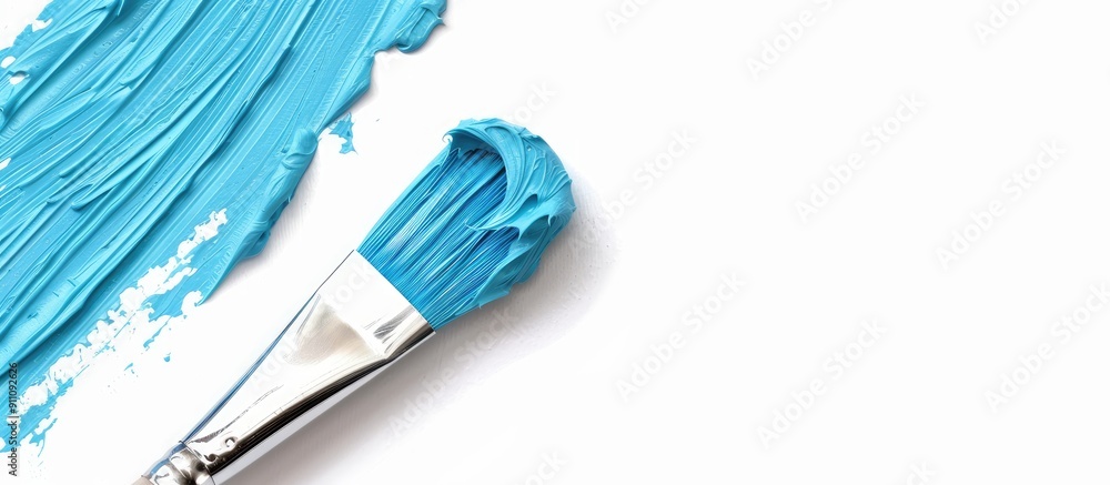 Light blue Plasticine brush isolated on a white backdrop with copy space image Light blue Plasticine brush isolated on a white backdrop with copy space image
