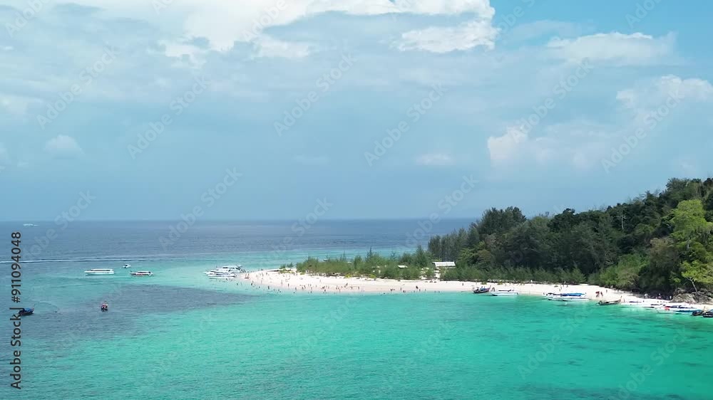 Many tourists enjoying their holiday on Bamboo Island in Krabi province, as seen from a drone 4K video Many tourists enjoying their holiday on Bamboo Island in Krabi province, as seen from a drone 4K video