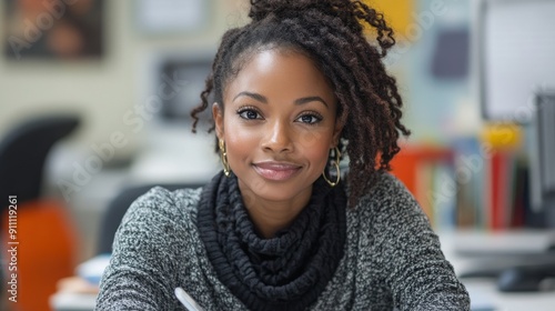 Dedicated Teacher Engaged in Crafting Detailed Lesson Plans at Organized Desk in Bright Classroom Setting