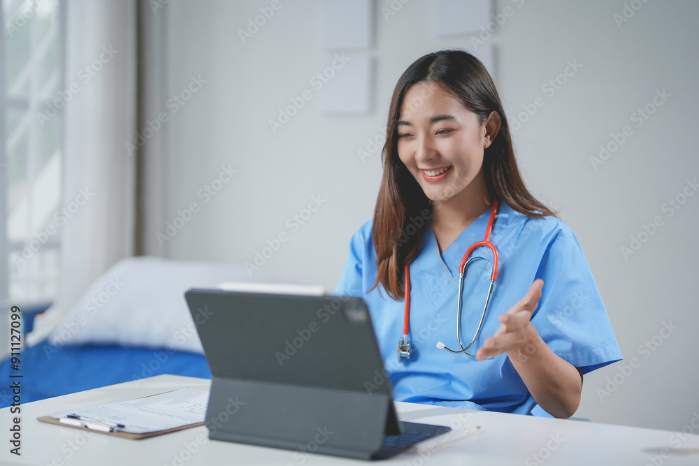 Smiling asian doctor on a video call, embodying modern healthcare. Bright, clean office with stethoscope and paperwork. Joyful, committed to remote patient care Smiling asian doctor on a video call, embodying modern healthcare. Bright, clean office with stethoscope and paperwork. Joyful, committed to remote patient care