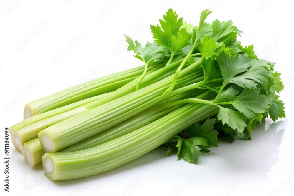 Fresh Celery Stalks with Green Leaves on White Background. Fresh Celery Stalks with Green Leaves on White Background.