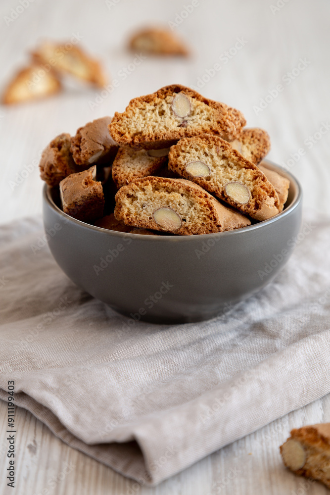 Homemade Almond Cantuccini Pastry in a Bowl, side view. Homemade Almond Cantuccini Pastry in a Bowl, side view.