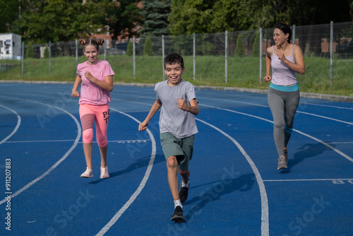 girl runs, runner, teenager, children's sports, runner, family engaged in sports, workout, warm-up, girl runs, woman runs, sports, treadmill, boy runs, happiness, childhood, happy family, funny boy