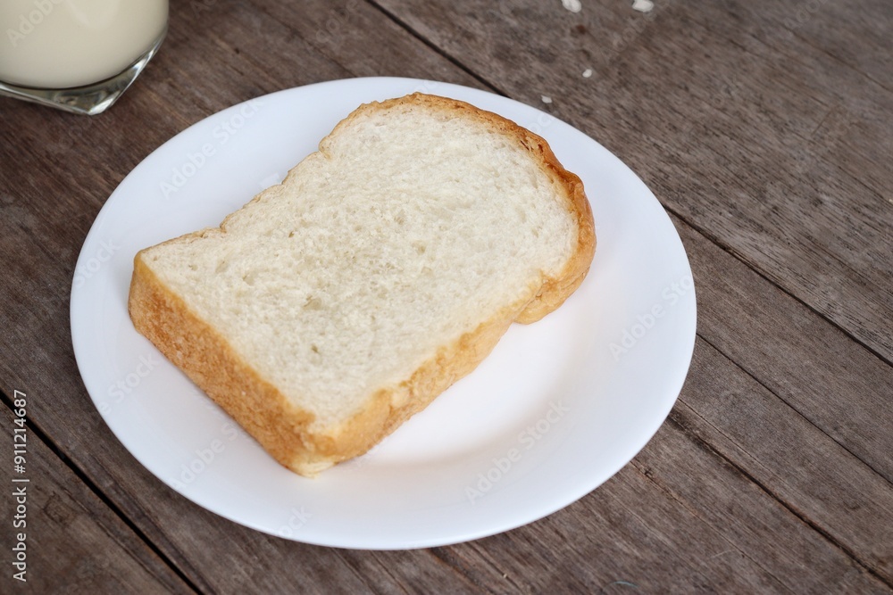 Breakfast of sliced bread and milk Breakfast of sliced bread and milk