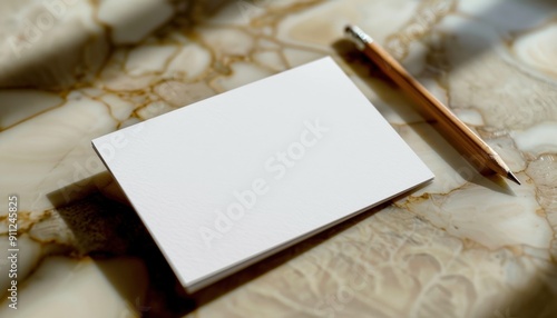 Blank Notepad and Pencil on Marble Surface in Natural Light During Daytime