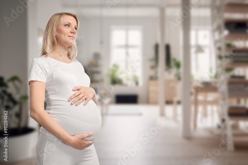 Happy young pregnant woman holds belly Free Download Happy young pregnant woman holds belly - GFXLoad