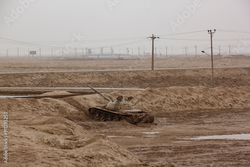 A retired tank on a battlefield belonging to the Iran Army. It served during the Iran-Iraq war. Now, the war is over and the leftover weapons can be seen around 