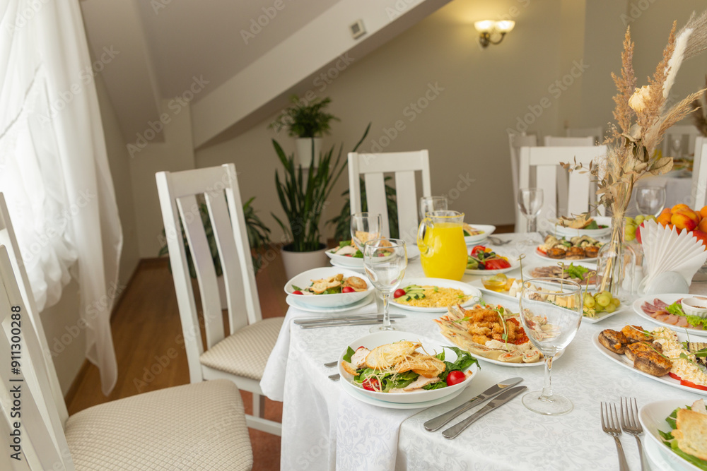Wedding banquet in restaurant, covered round table for guests Wedding banquet in restaurant, covered round table for guests