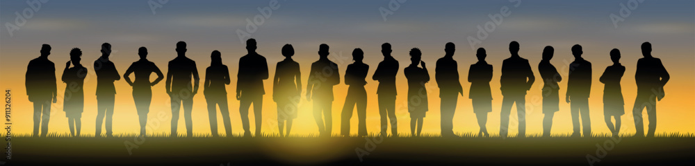 Fototapeta premium Silhouette group of people standing together on hill in evening with sunset background.