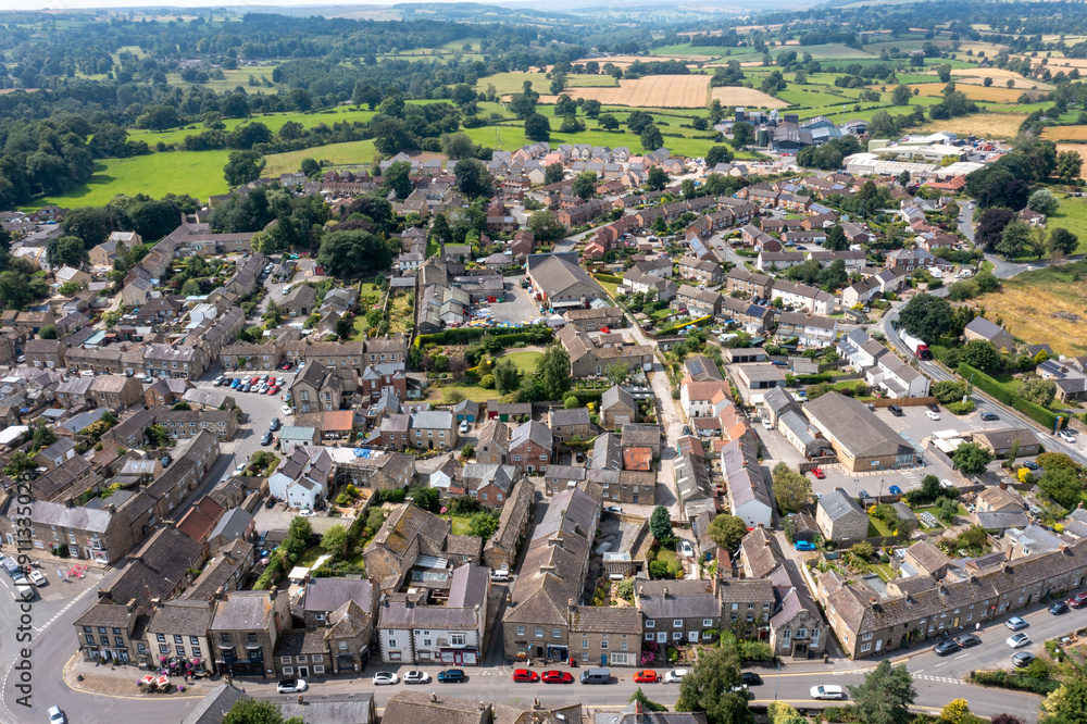 Aerial drone photo of the beautiful town of Masham, Ripon in North Yorkshire in the UK showing the British countryside town from above in the summer time