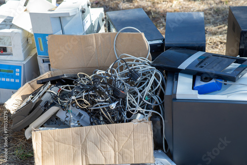 Fotografi Waste electronic and electrical equipment (e-waste) , box with cables, wires, consists of used and discarded desktop, printers