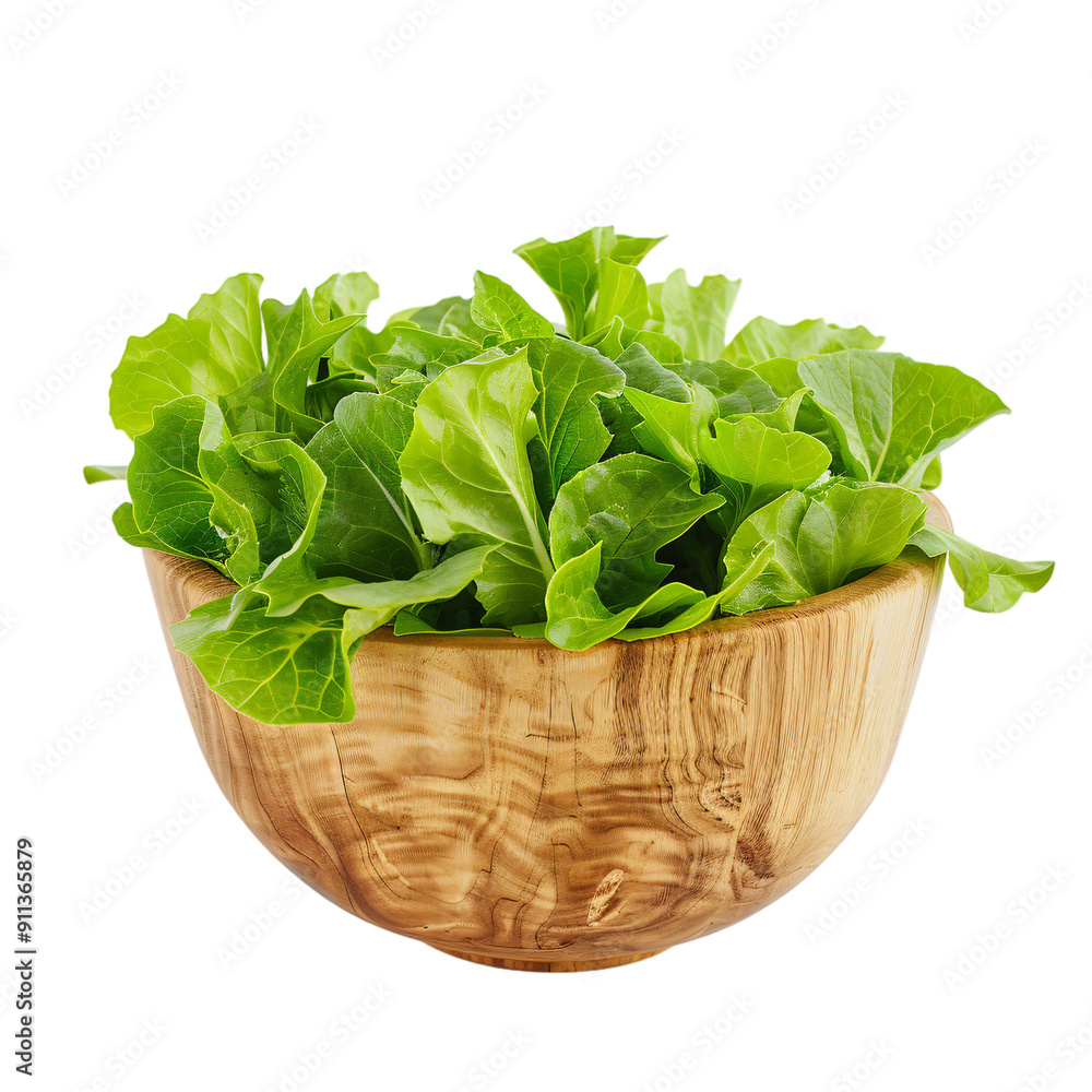 A wooden bowl filled with fresh green leafy vegetable A wooden bowl filled with fresh green leafy vegetable