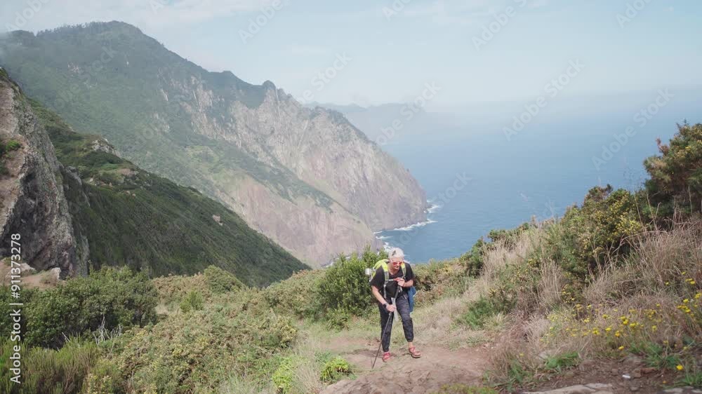 girl hiking alone in fog in the mountains girl hiking alone in fog in the mountains