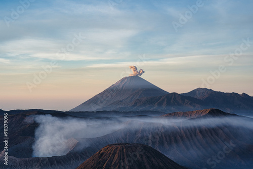 Mount Bromo volcano (Gunung Bromo) during sunrise on Mount Penanjakan, in East Java, Indonesia. photo