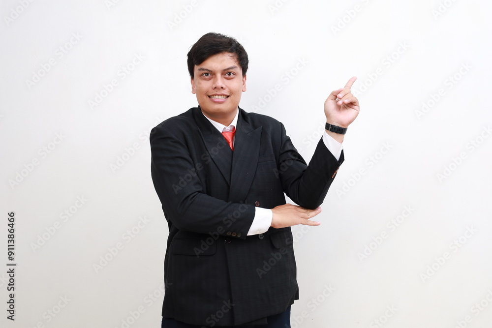 Young employee businessman corporate lawyer point index finger aside on empty space area mock up isolated on white background studio Young employee businessman corporate lawyer point index finger aside on empty space area mock up isolated on white background studio
