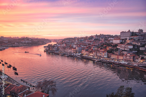 Cloudy sunset view of Dom Luiz bridge, Porto, Portugal