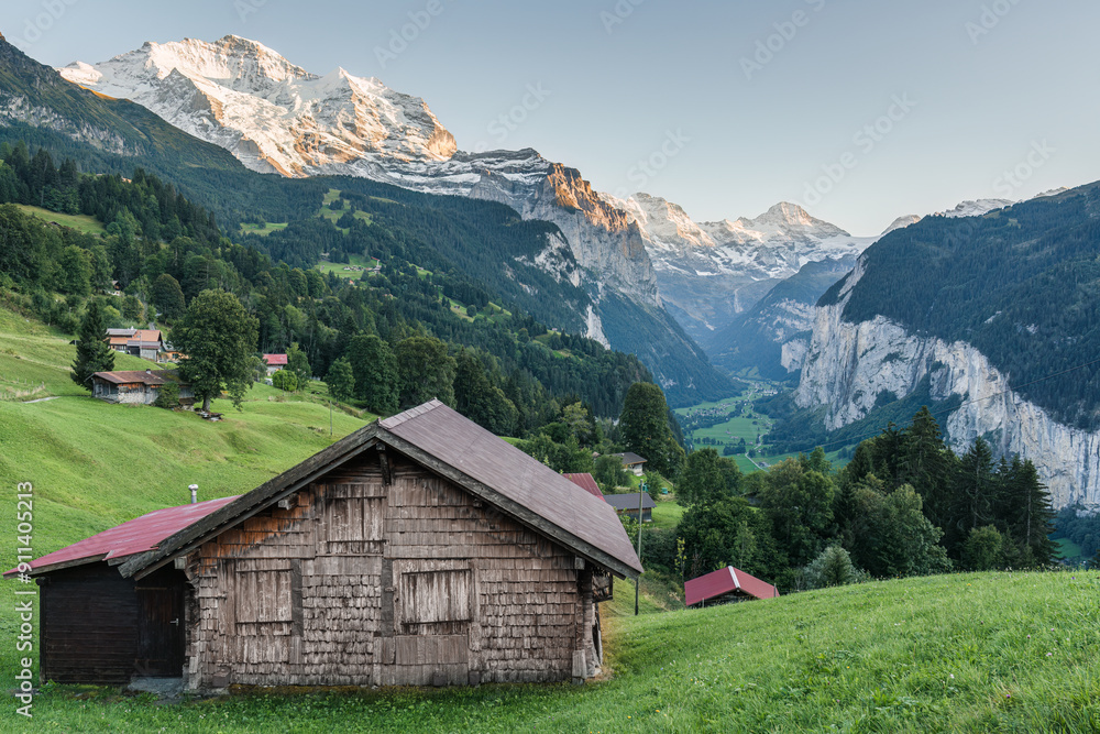 View from Wengen mountain village on bernese oberland and Lauterbrunnen valley in the evening at Switzerland View from Wengen mountain village on bernese oberland and Lauterbrunnen valley in the evening at Switzerland