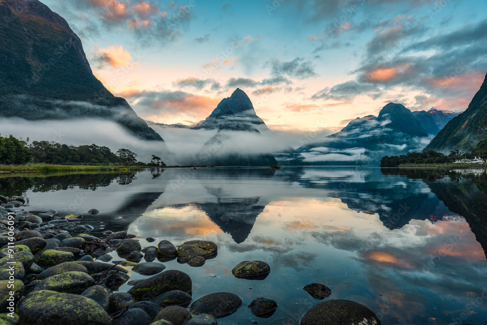 © Mumemories - Milford Sound with Mitre peak in foggy on the lake during the morning at New Zealand