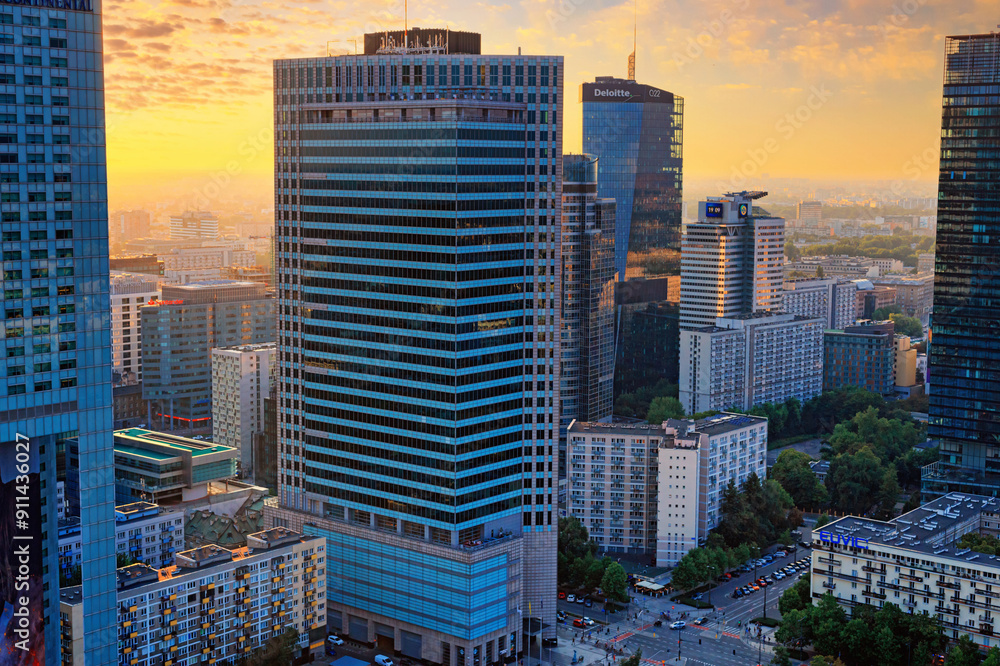 Cityscape at sunset - top view of the Downtown district of Warsaw with high-rise buildings, located within the Wola district in western Warsaw, Poland, 20 August, 2022