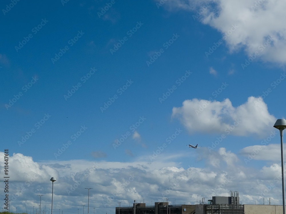 Summer white fluffy cumulus clouds in the deep blue sky Summer white fluffy cumulus clouds in the deep blue sky