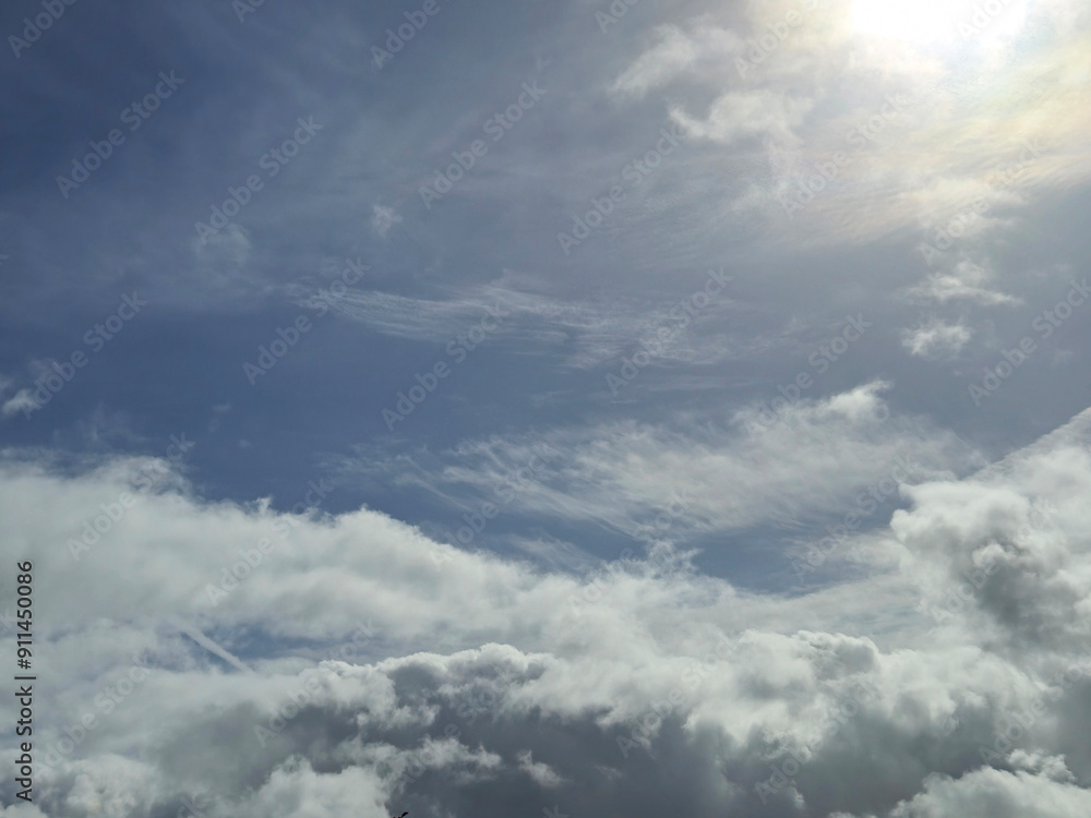 Summer white fluffy cumulus clouds in the deep blue sky Summer white fluffy cumulus clouds in the deep blue sky