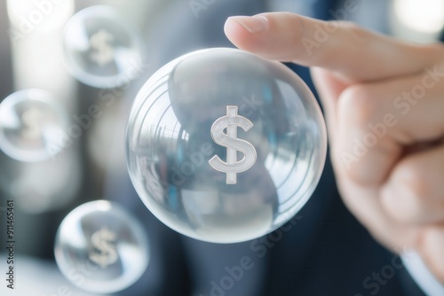 Hand Holding a Cracked Bubble with Dollar Symbol, The state of the dollar bubble