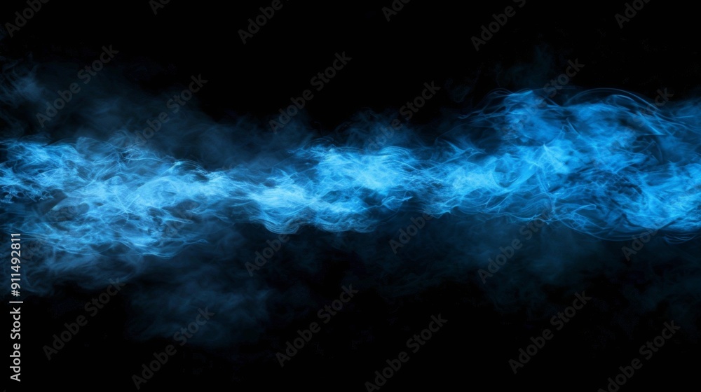 Swirling blue smoke against dark background. Swirling blue smoke against dark background.