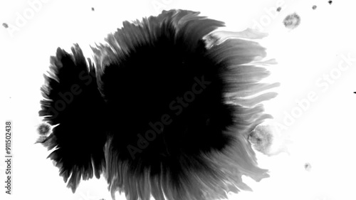 black ink drops on wet paper mask