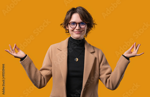 Calm boss woman relaxing, meditating,refuses stress. Pretty lady breathes deeply photo