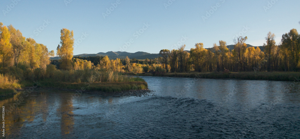 Obraz premium autumn river sunset
