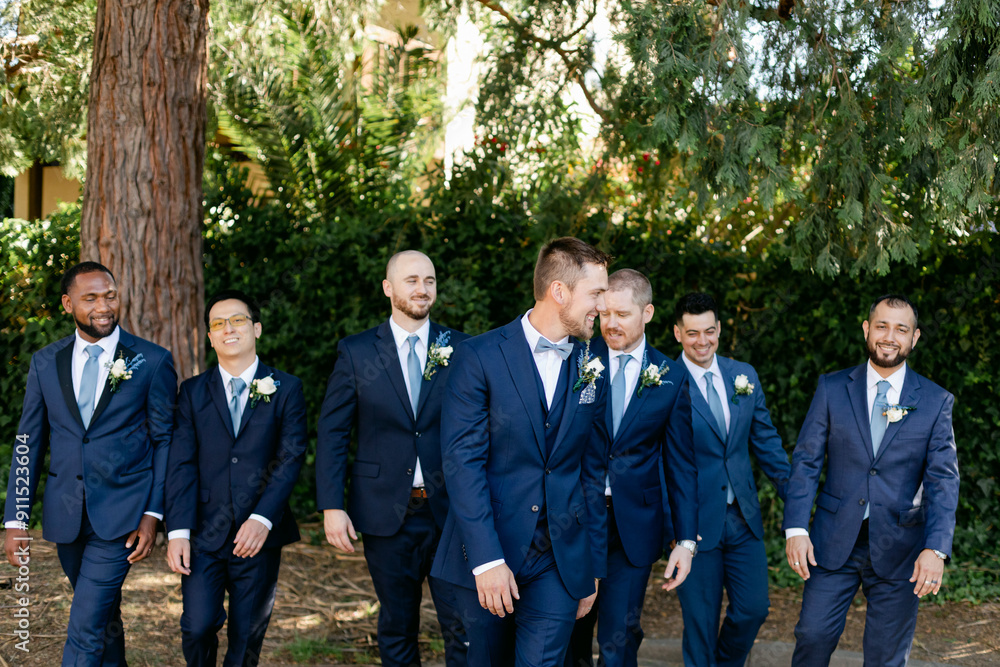 Groom and Groomsmen Celebrate After Wedding Ceremony Groom and Groomsmen Celebrate After Wedding Ceremony