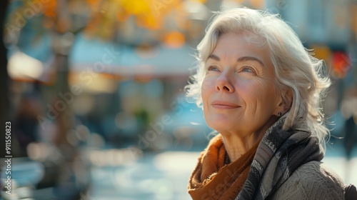 Portrait of a mature female enjoying outdoor city weather