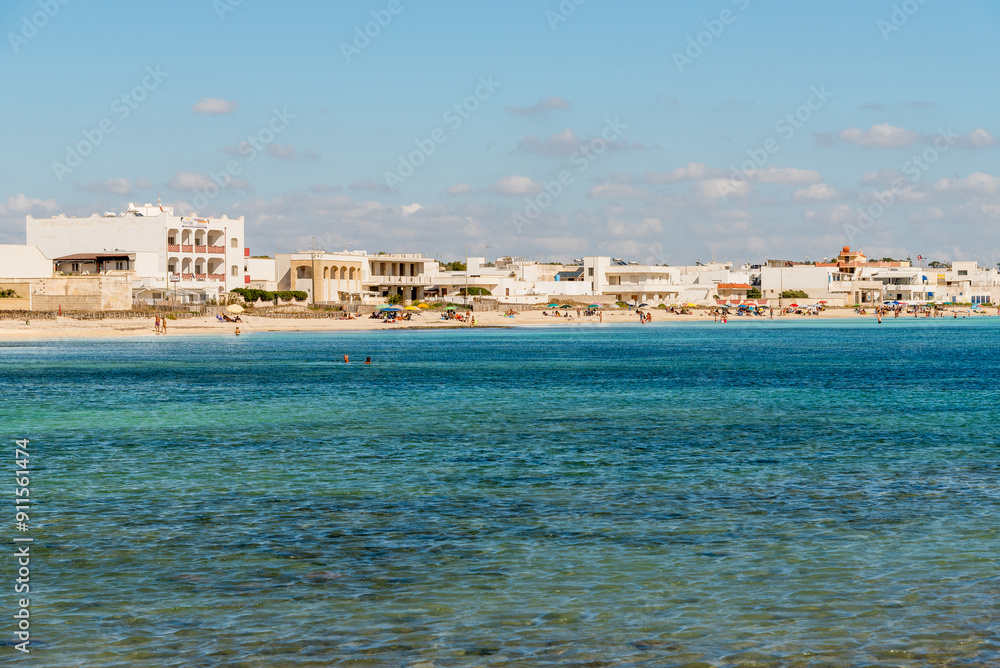 Fototapeta premium Punta Prosciutto, Puglia, Italy - October 7, 2023: White beach of Punta Prosciutto on the Ionian sea in province of Lecce.