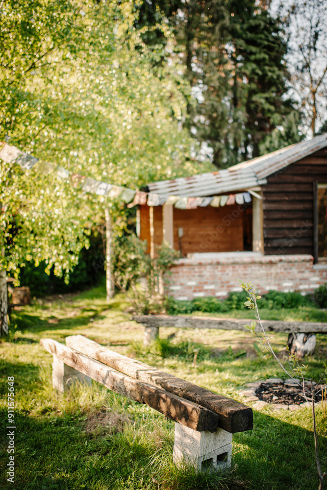 Backyard shed with seating area, gate and greenery Backyard shed with seating area, gate and greenery