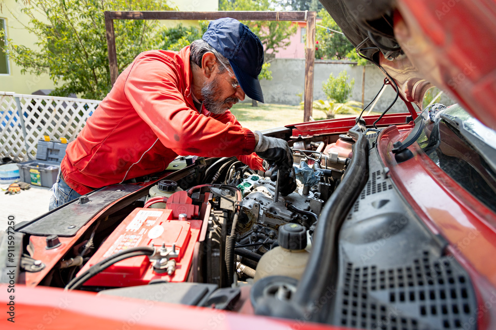 An expert mechanic performs maintenance on your vehicle's engine An expert mechanic performs maintenance on your vehicle's engine