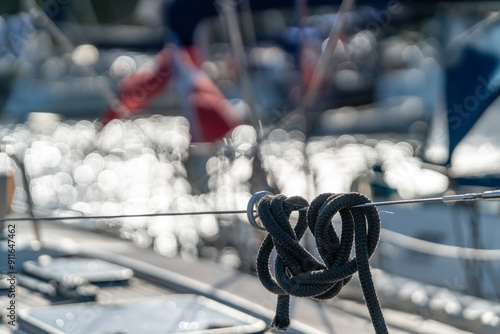 yacht in the harbor with danish flag waving on a blue sky photo