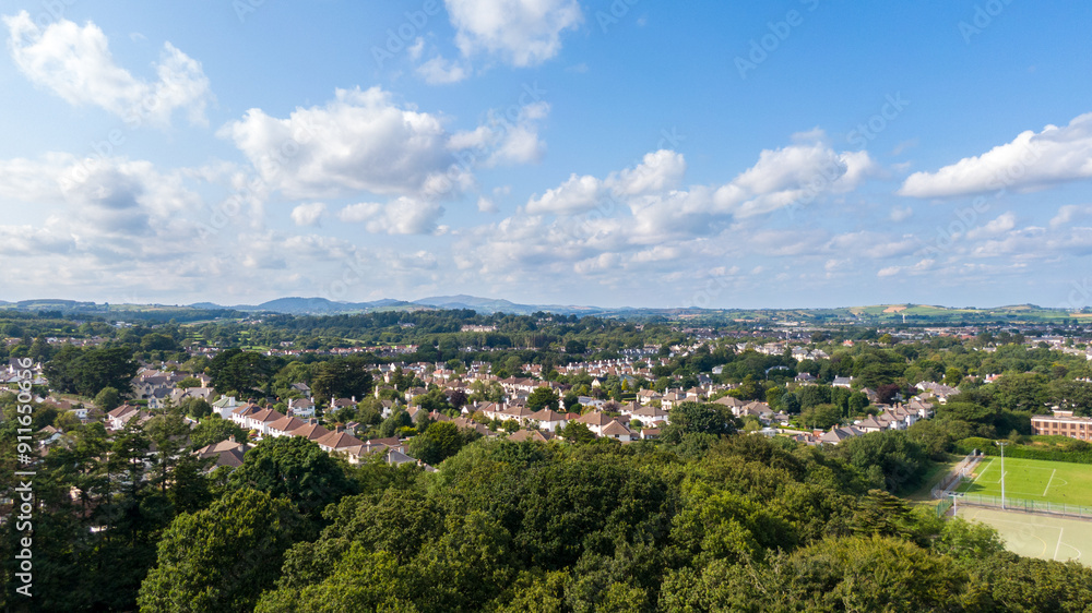 Aerial view on houses on coast of see in Newcastle, Northern Ireland. Coastal town, Drone photo Aerial view on houses on coast of see in Newcastle, Northern Ireland. Coastal town, Drone photo