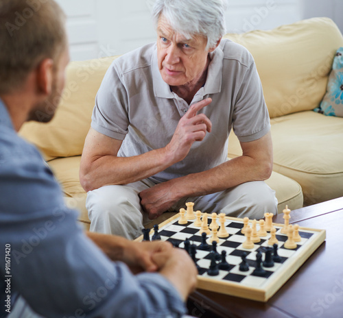 Senior dad, man or teaching chess in home for games or competition with strategy and problem solving. Elderly parent, lesson and board for challenge or learning thinking skills for cognitive function