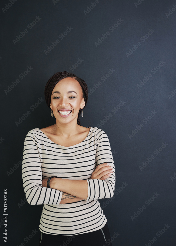 Portrait, smile and business woman with arms crossed in studio for career or job experience. Face, confidence and African professional, employee and creative copywriter isolated on black background Portrait, smile and business woman with arms crossed in studio for career or job experience. Face, confidence and African professional, employee and creative copywriter isolated on black background