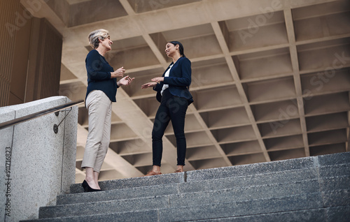 Bild auf Leinwand Stairs, discussion and business women in city for collaboration, partnership or project feedback
