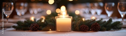 Festive table setting with pine boughs and candles photo