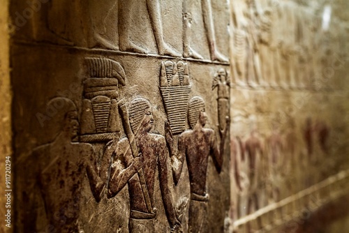Ancient Egyptian mural with human figures, cultural heritage