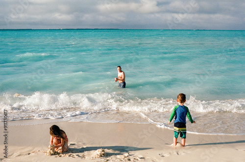 Swimming and Playing on Family Beach Vacation in the Bahamas photo