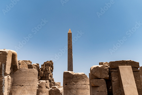Obelisk among ruins at Karnak Temple, travelling Egypt